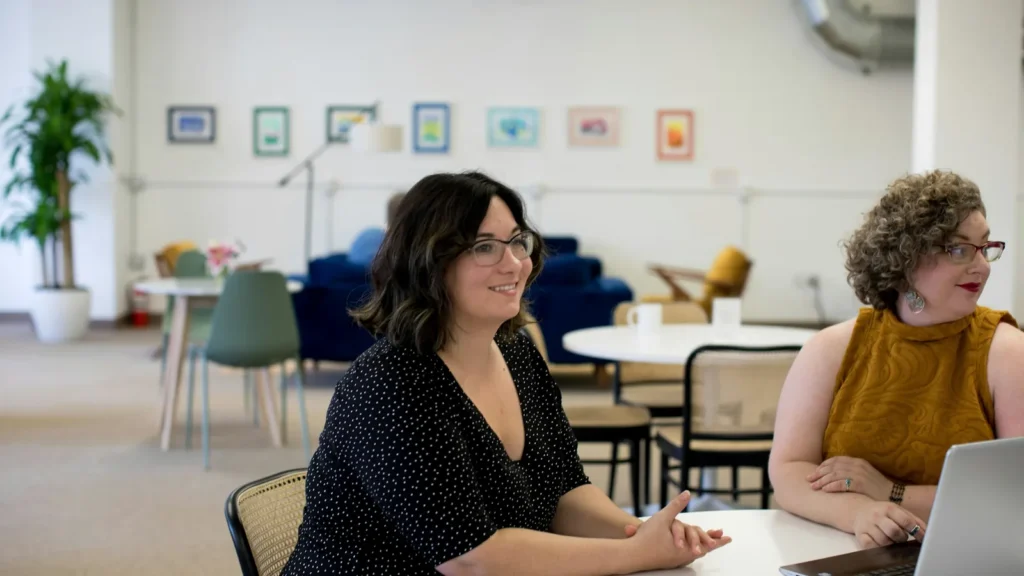 Colleagues meeting around a table